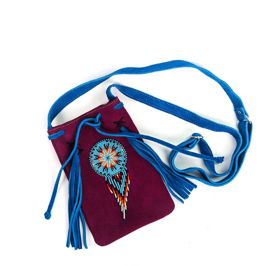 Floral hand embroidered leather suede handbag Wara range.